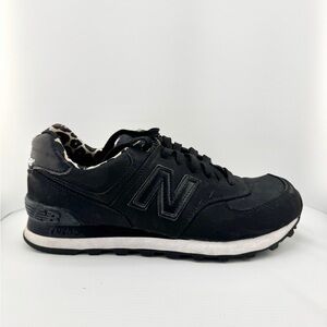 New Balance women’s Black and White Sneakers